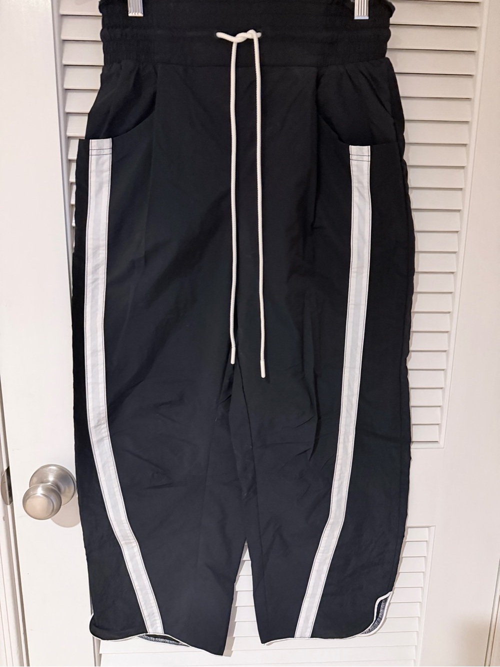 Free people movement women's champ Black Track Pants with White Stripe